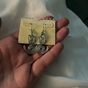 NWT silver tone dangly cat Earrings